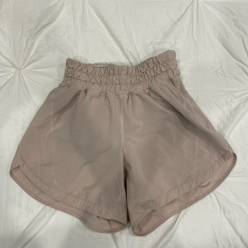 Lululemon shorts size 2 with 4” inseam. They are a light blush color.